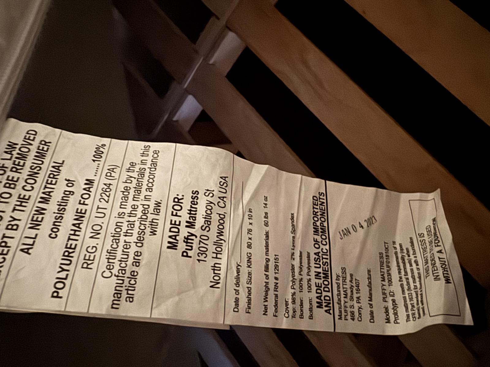Law tag showing manufacture date